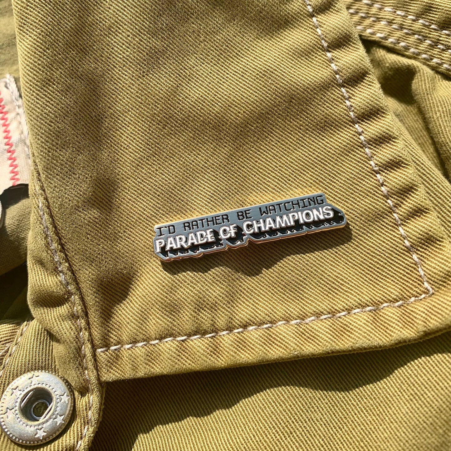 I'd Rather Be Watching Parade of Champions Enamel Pin